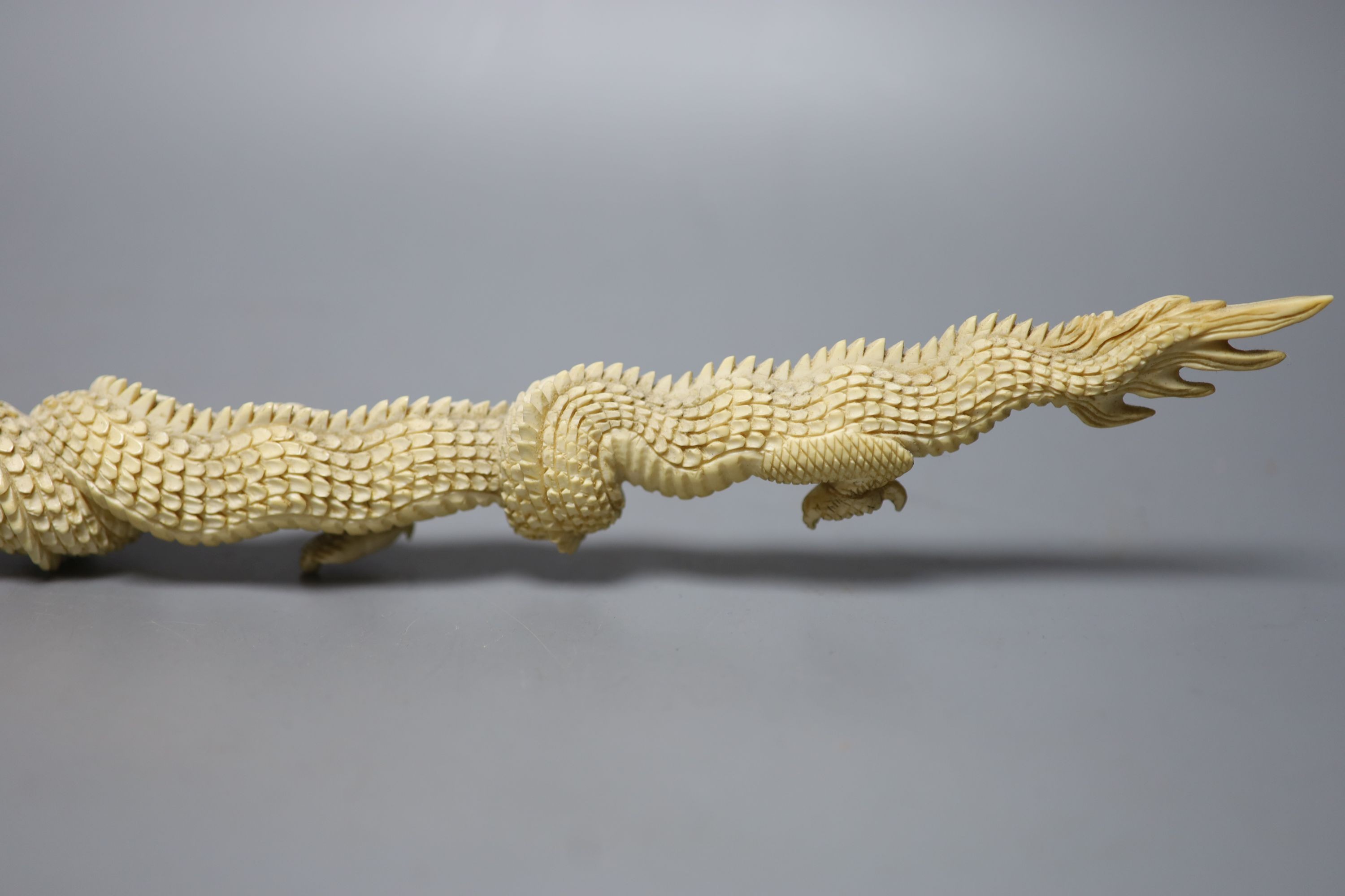 An Indonesian ivory carving of a dragon, first half of 20th century 52cm, , An Indonesian ivory carving of a dragon, first half of 20th century